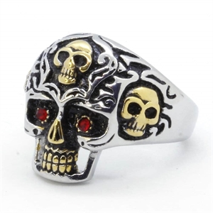 Scull ring with red stone.